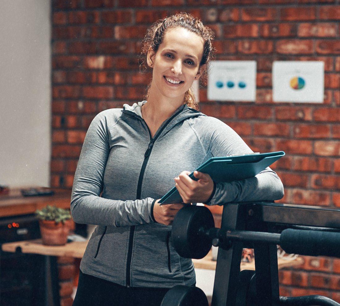 Coach responsable de la gestion d'une salle de sport